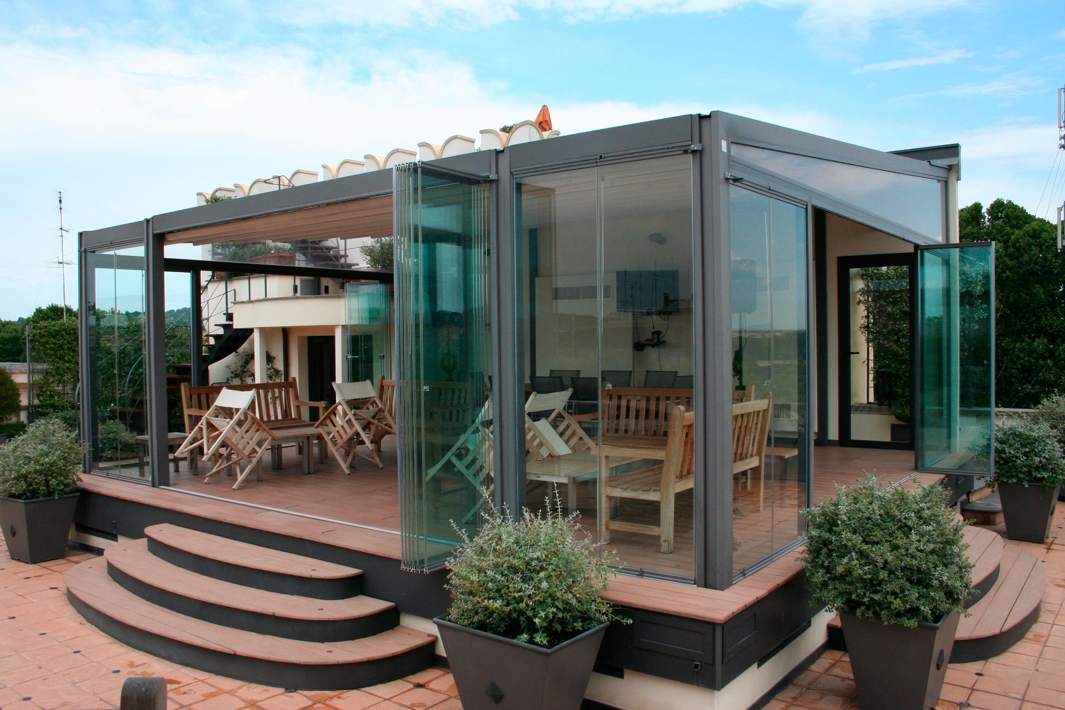 Glass enclosure with sliding door in Rome, Italy.