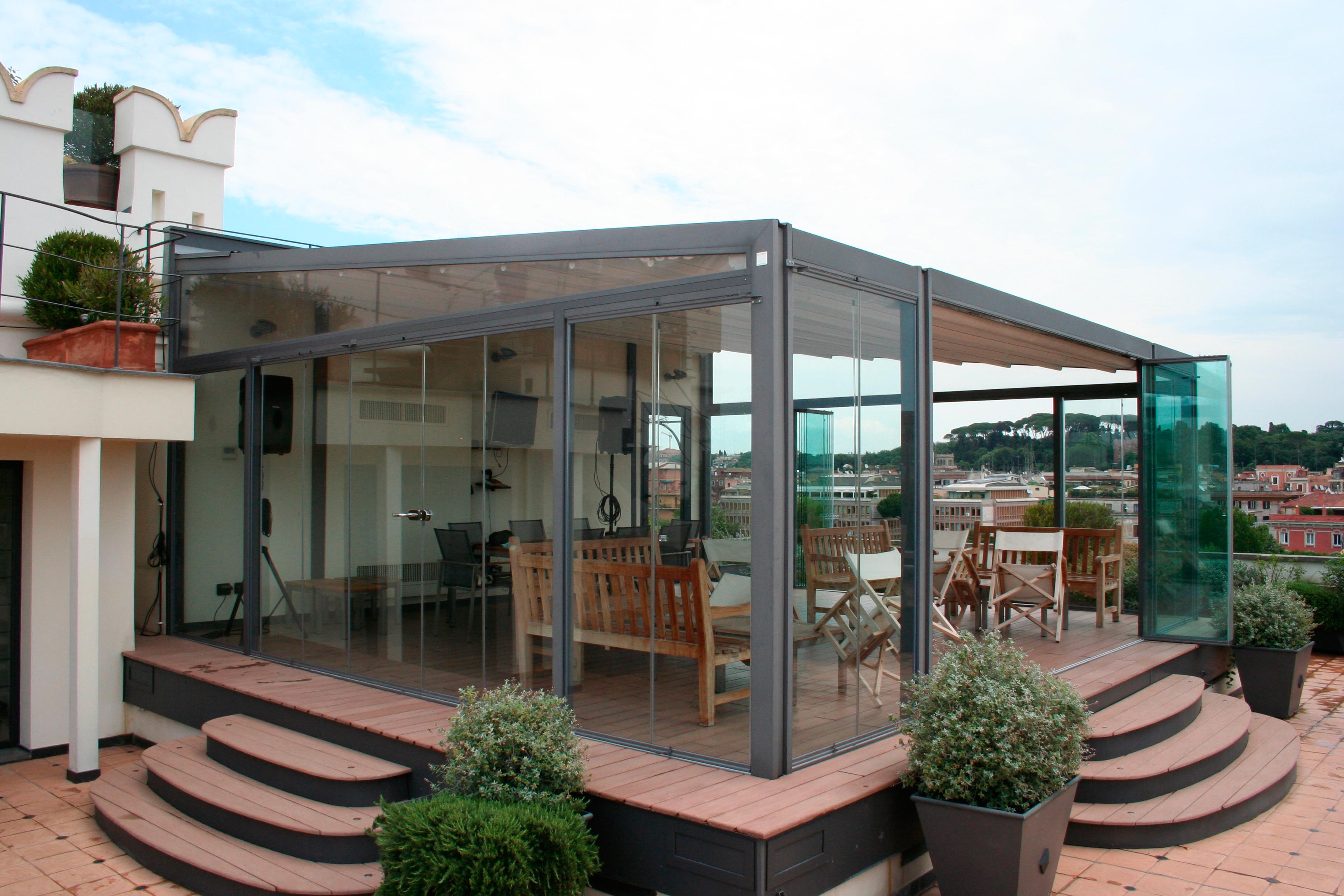 Glass enclosure with sliding door in Rome, Italy.