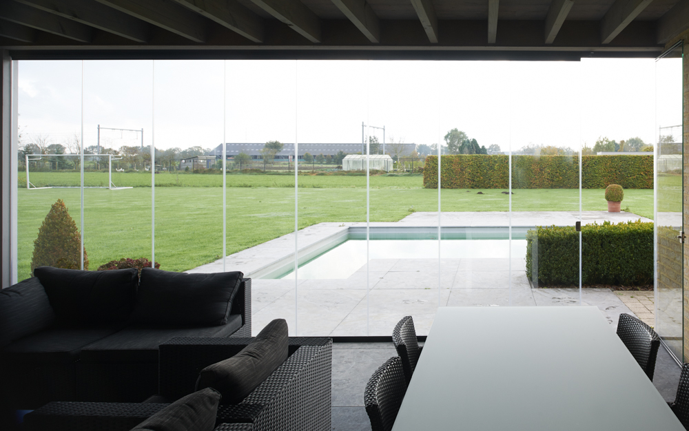 Glass enclosure in a porch in Belgium views