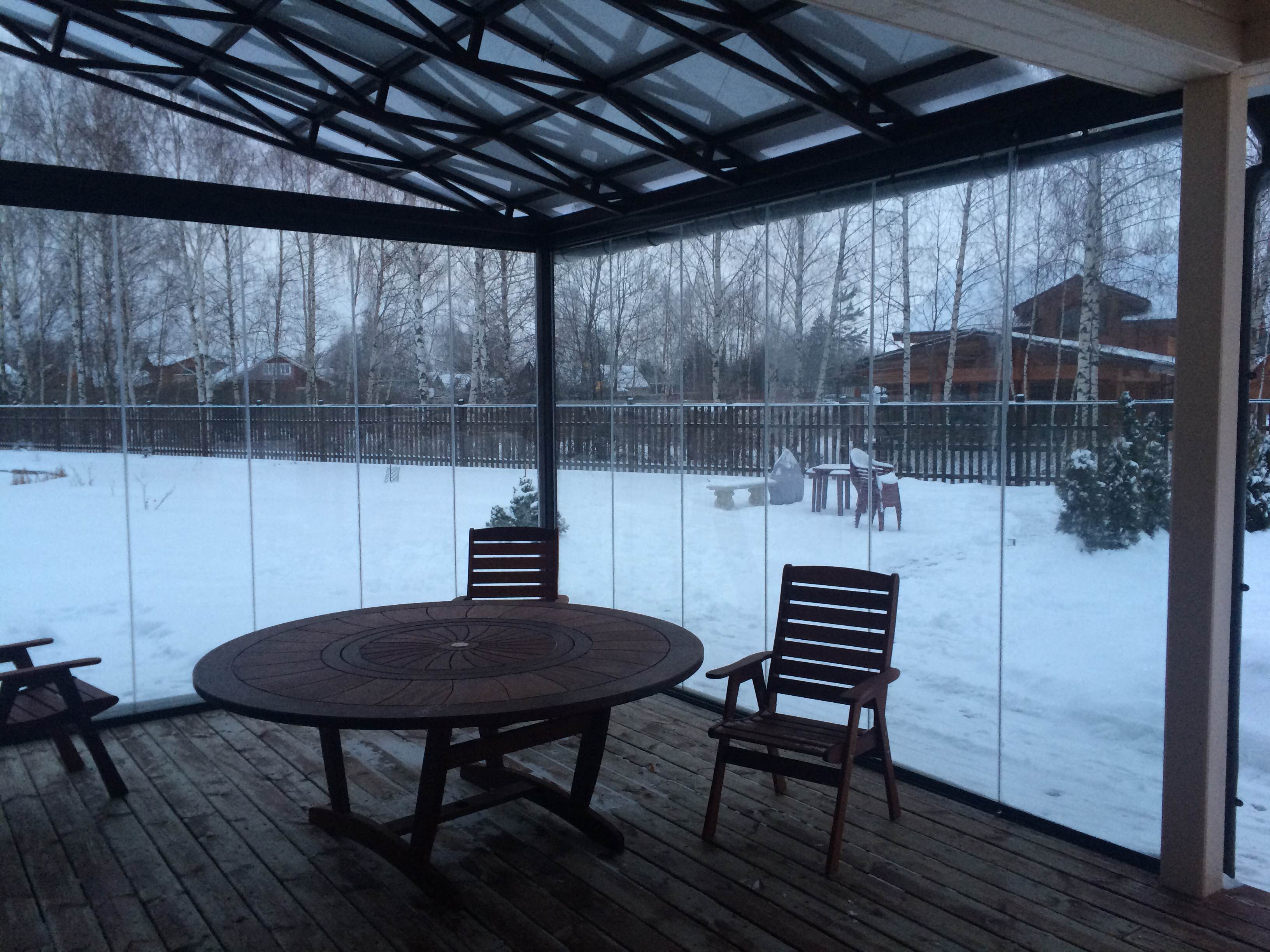 Glass enclosure in a porch in Moscow in winter time